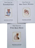 Three books from Beatrix Potter's series on a light blue background
