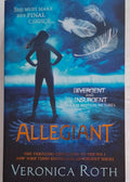 Book cover of 'Allegiant' by Veronica Roth with a silhouette and feathers on a blue background.